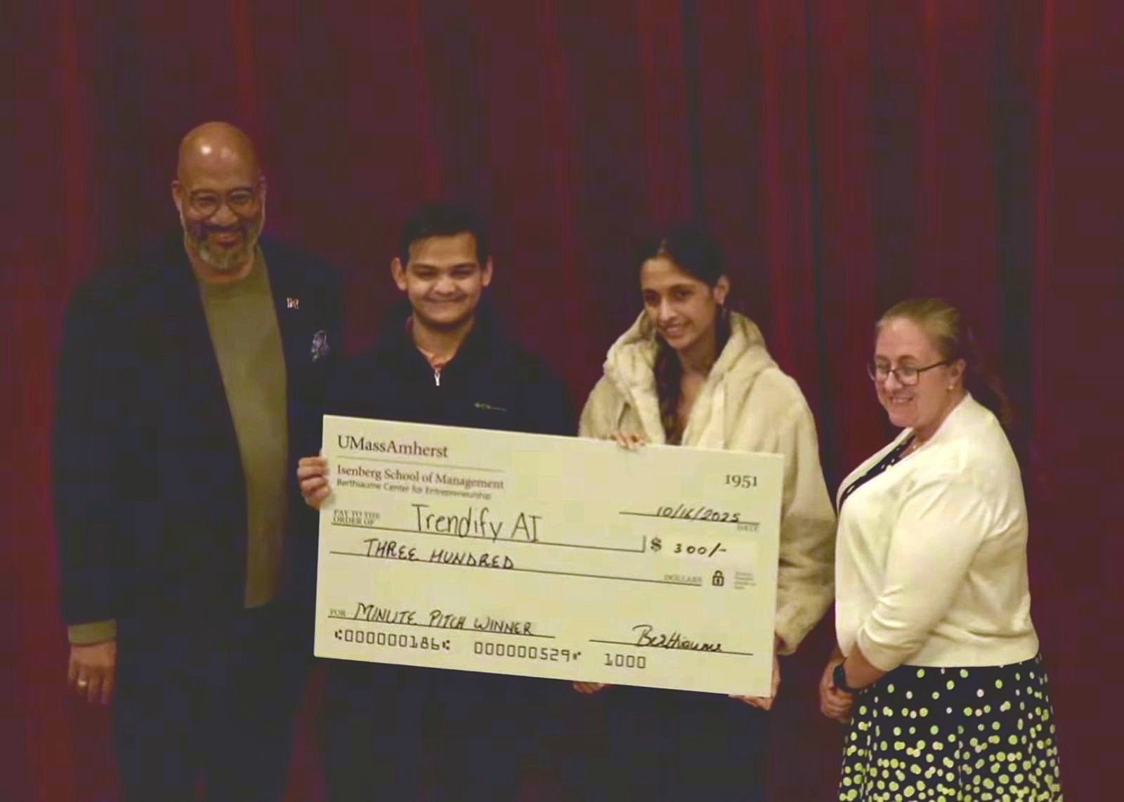 A $300 Minute Pitch winner cheque awarded to Trendify AI by the Berthiaume Center for Entrepreneurship at UMass Amherst